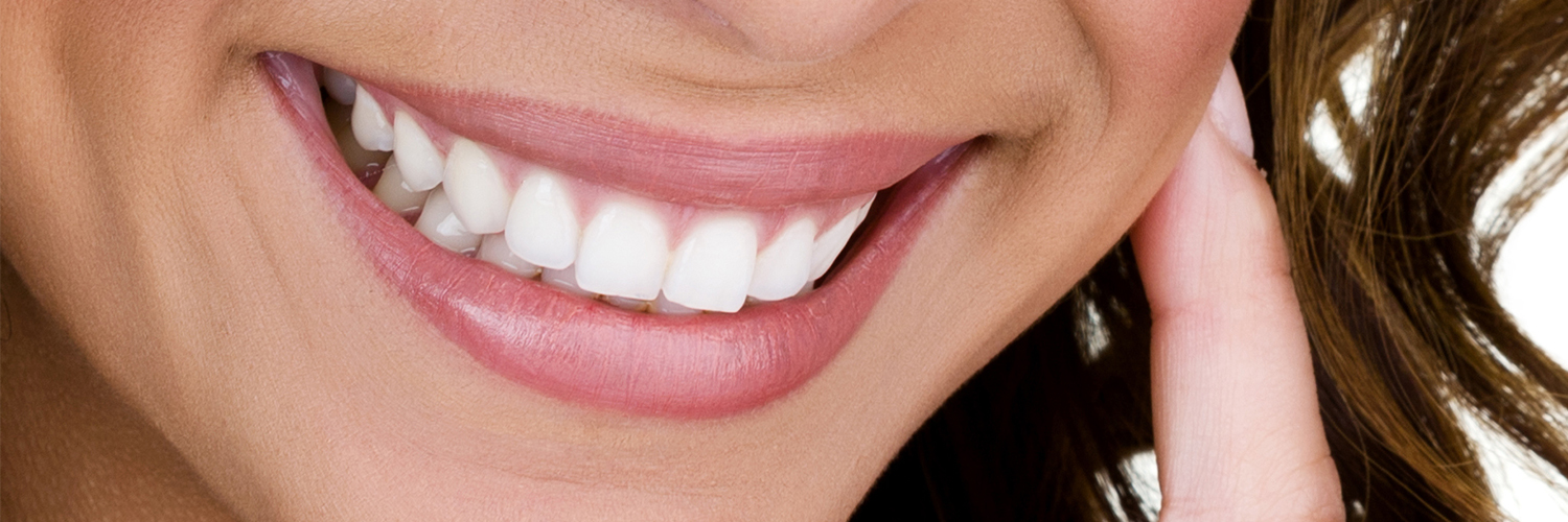 Woman_Smiling_Teeth_Whitening